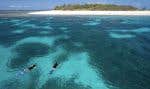 Plongée en apnée dans les parages de l'île Wilson, dans le parc marin de la Grande Barrière de Corail